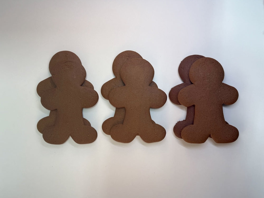 gingerbread man cutouts on a white background