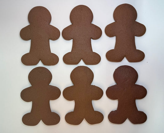 gingerbread man cutouts on a white background