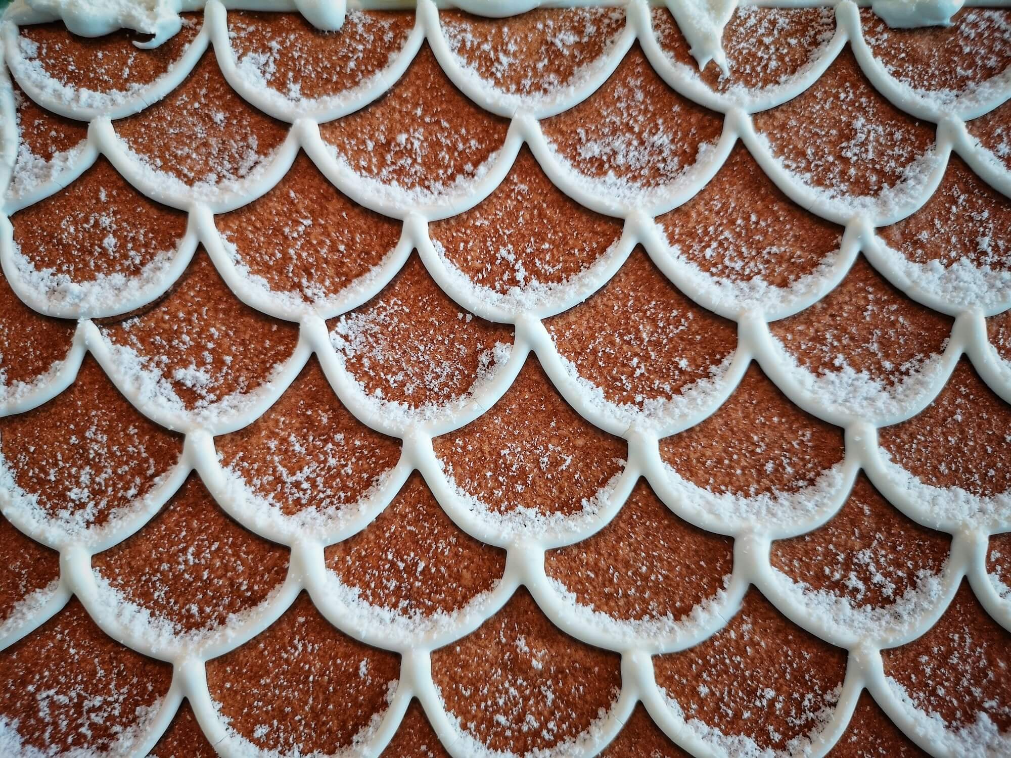 Close-up of a gingerbread with a fish scale pattern